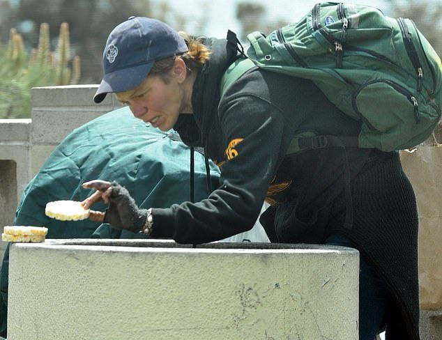 Loni WilliSon Searching Trash